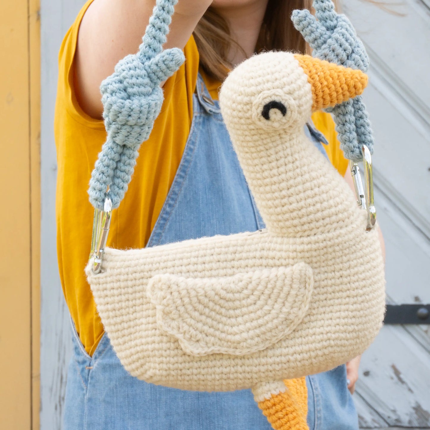 Crochet white goose bird bag with blue bag strap 