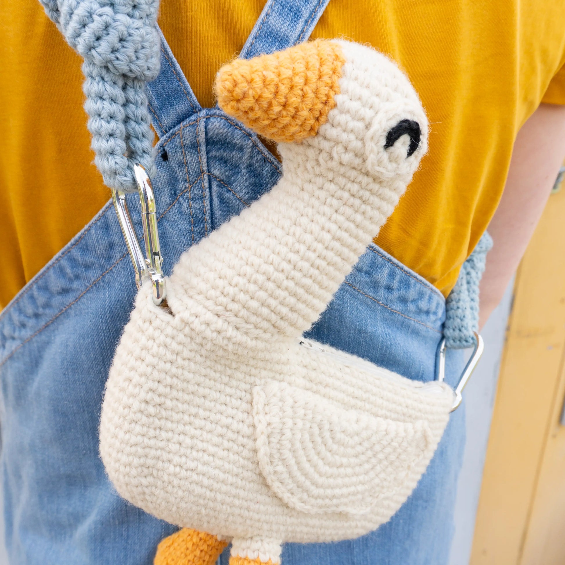 Crochet white goose bird bag with blue bag strap 