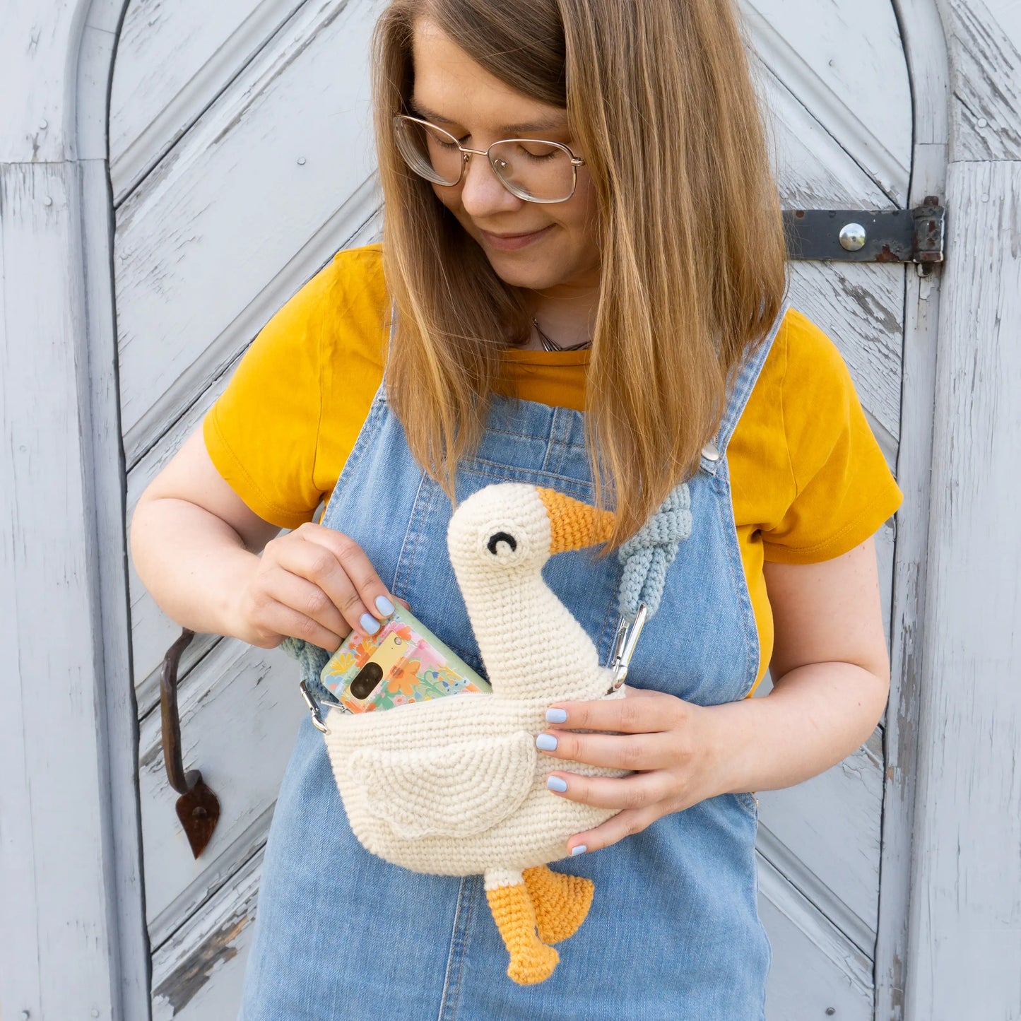Crochet white goose bird bag with blue bag strap 